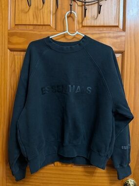 Essentials Black Oversized Crewneck Sweatshirt with Logo Tag